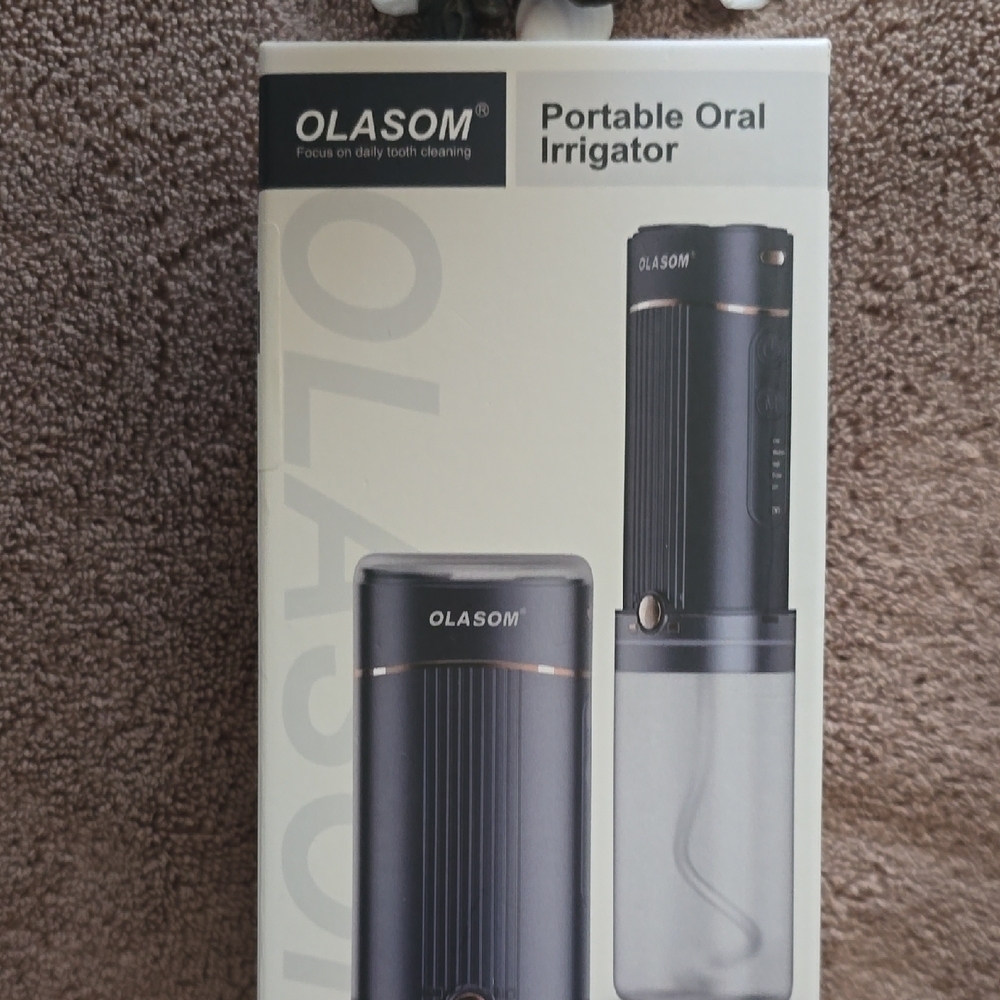 Olasom. Portable Oral Irrigator in White